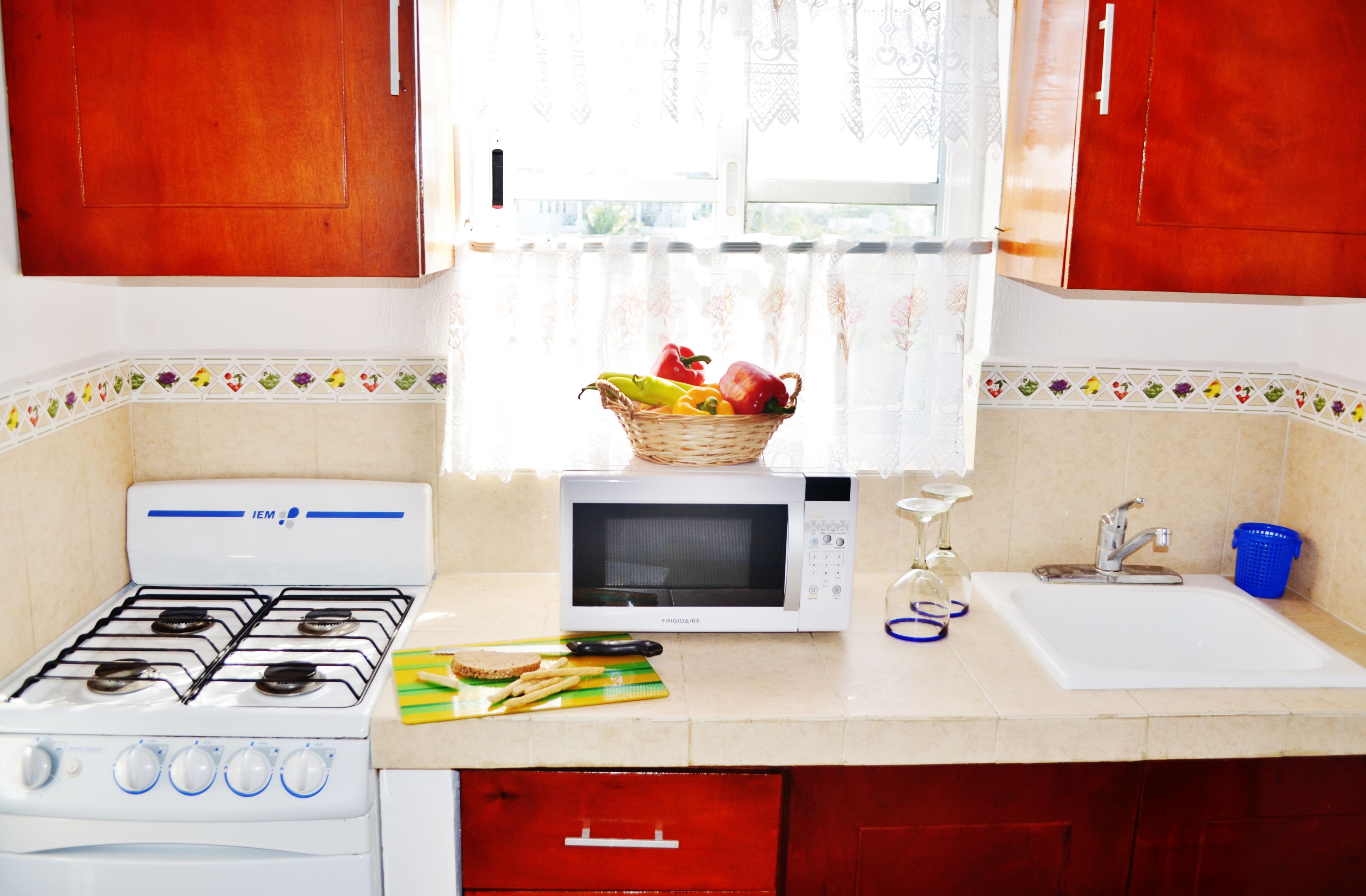 deluxe suite, 1 bedroom, kitchen, partial ocean view | private kitchen