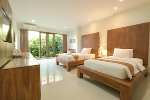 Habitación Premier con 1 cama doble o 2 individuales, vistas al jardín | 1 dormitorio, ropa de cama de alta calidad, minibar y caja fuerte