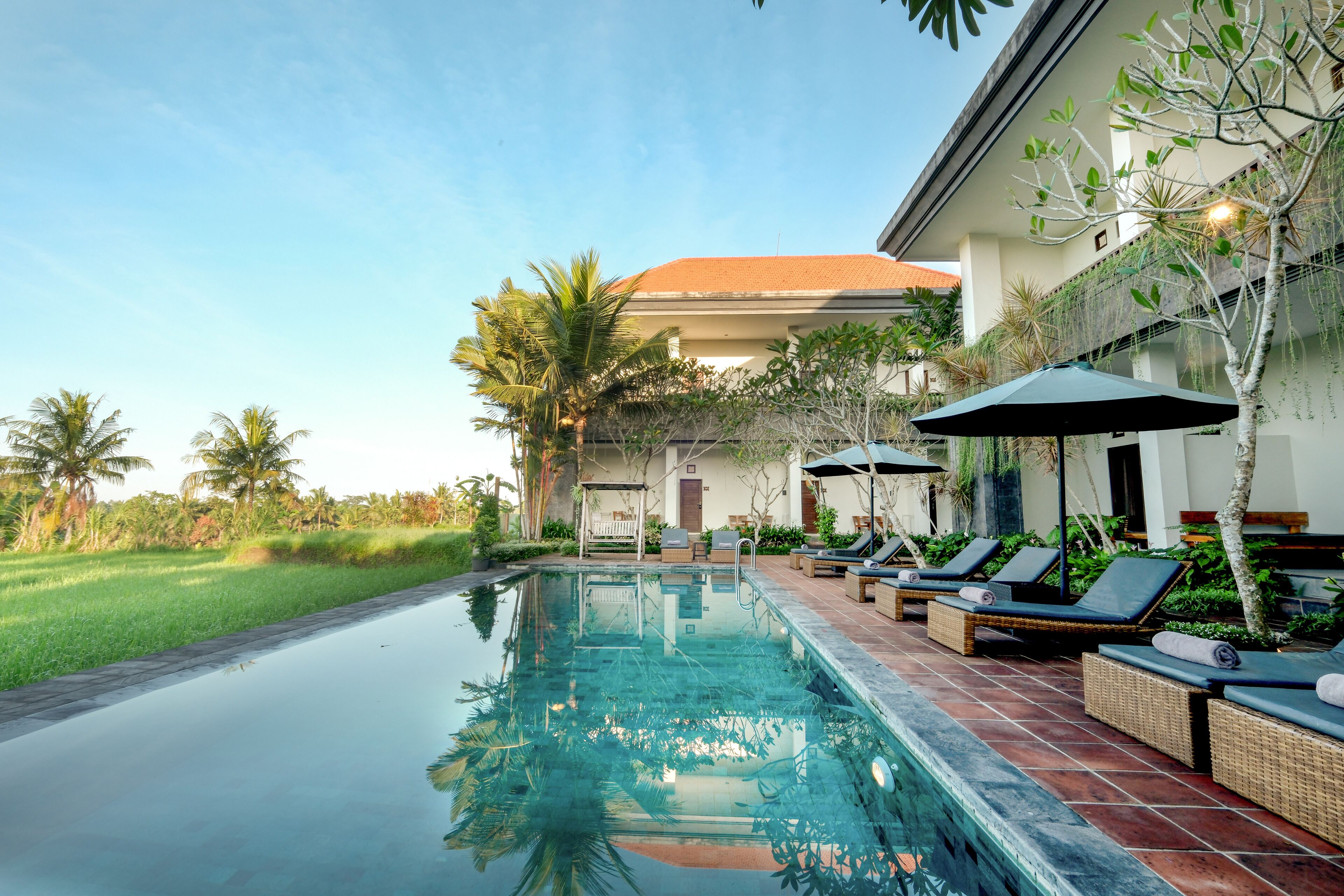 2 outdoor pools, pool umbrellas, pool loungers