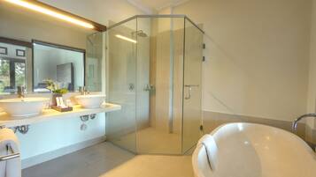 Suite, Pool View | Bathroom | Combined shower/bathtub, deep-soaking bathtub, free toiletries
