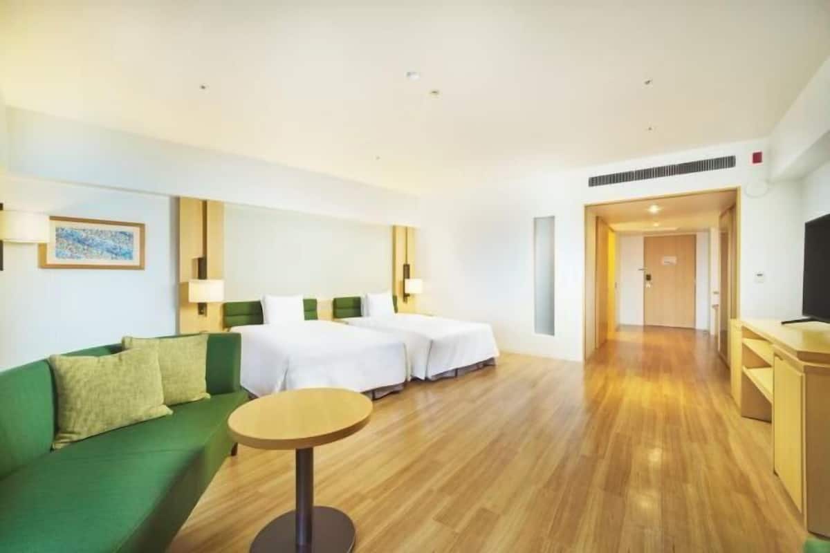 Premium bedding, down duvets, in-room safe, desk