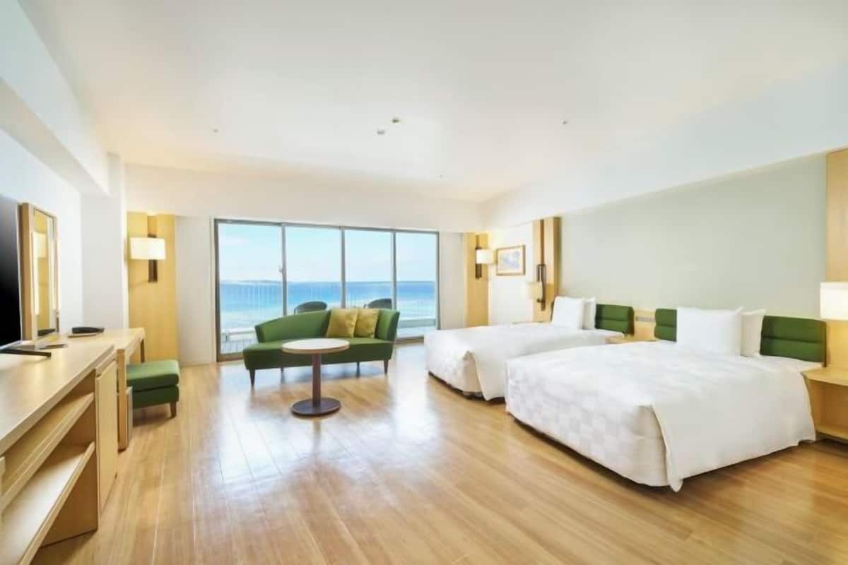 Premium bedding, down duvets, in-room safe, desk