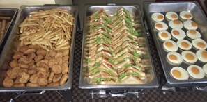 Three food trays with French fries, sandwiches, and fried eggs. - Siwalai City Place (Pattaya)