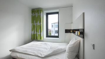 Hypo-allergenic bedding, down comforters, desk, soundproofing