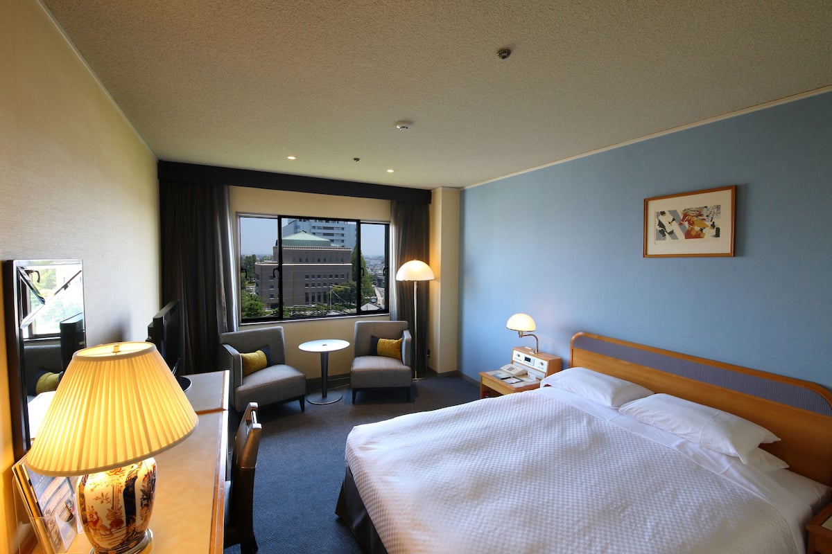 Premium bedding, down duvets, in-room safe, desk