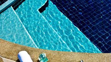 Outdoor pool, pool umbrellas, pool loungers