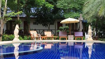 Outdoor pool, pool umbrellas, sun loungers