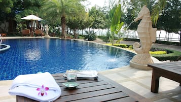 Outdoor pool, pool umbrellas, sun loungers