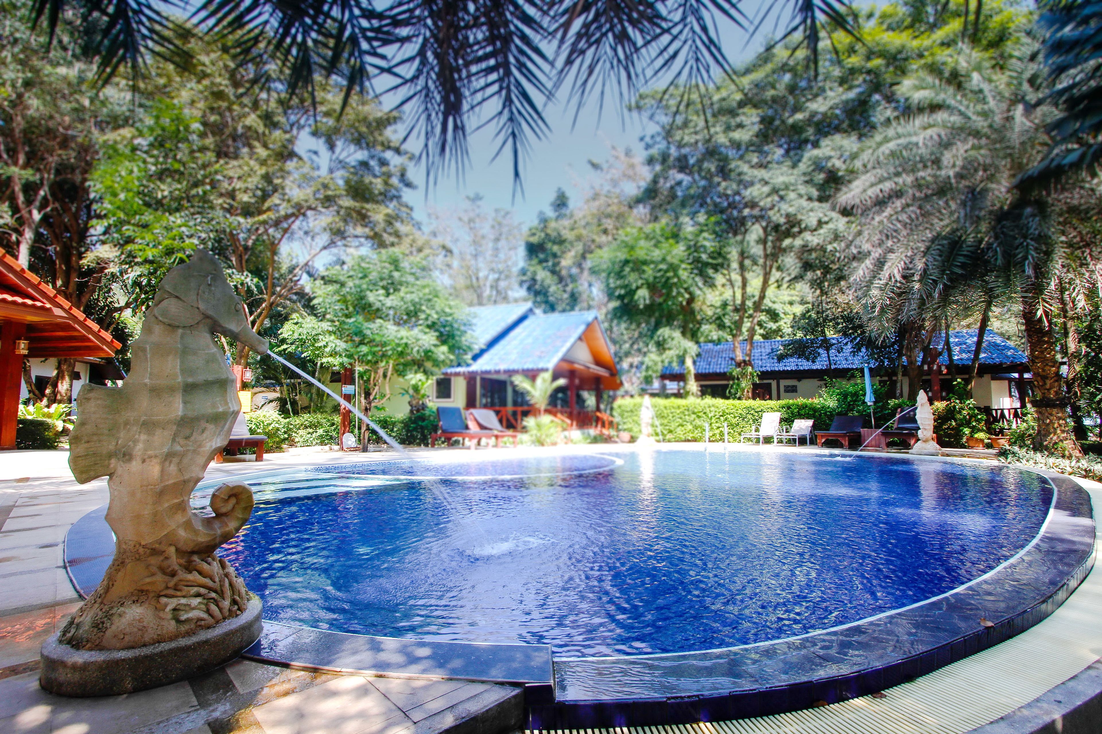 outdoor pool, pool umbrellas, pool loungers