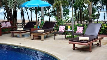 Outdoor pool, pool umbrellas, pool loungers