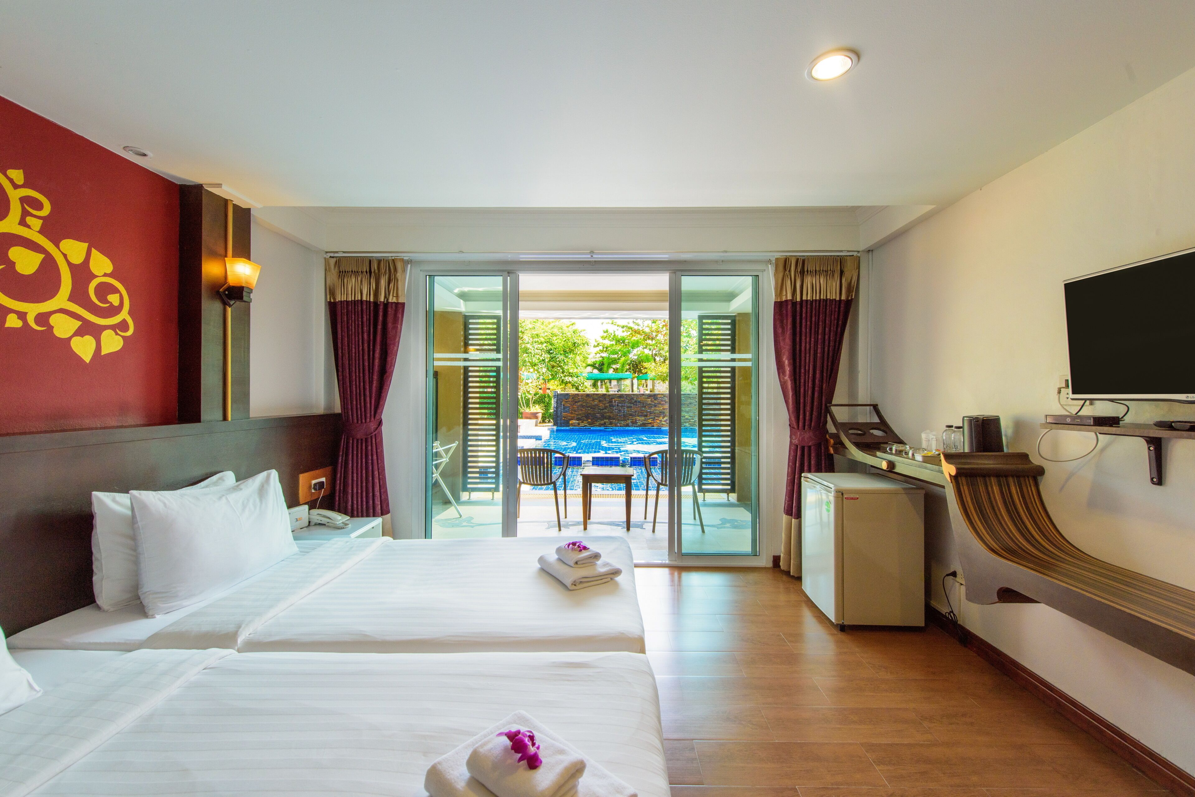 deluxe room, pool access | in-room safe, blackout curtains, free wifi