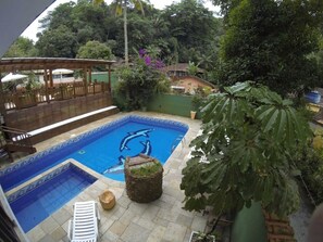 Outdoor pool, pool umbrellas, sun loungers