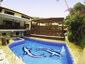 Outdoor pool, pool umbrellas, sun loungers