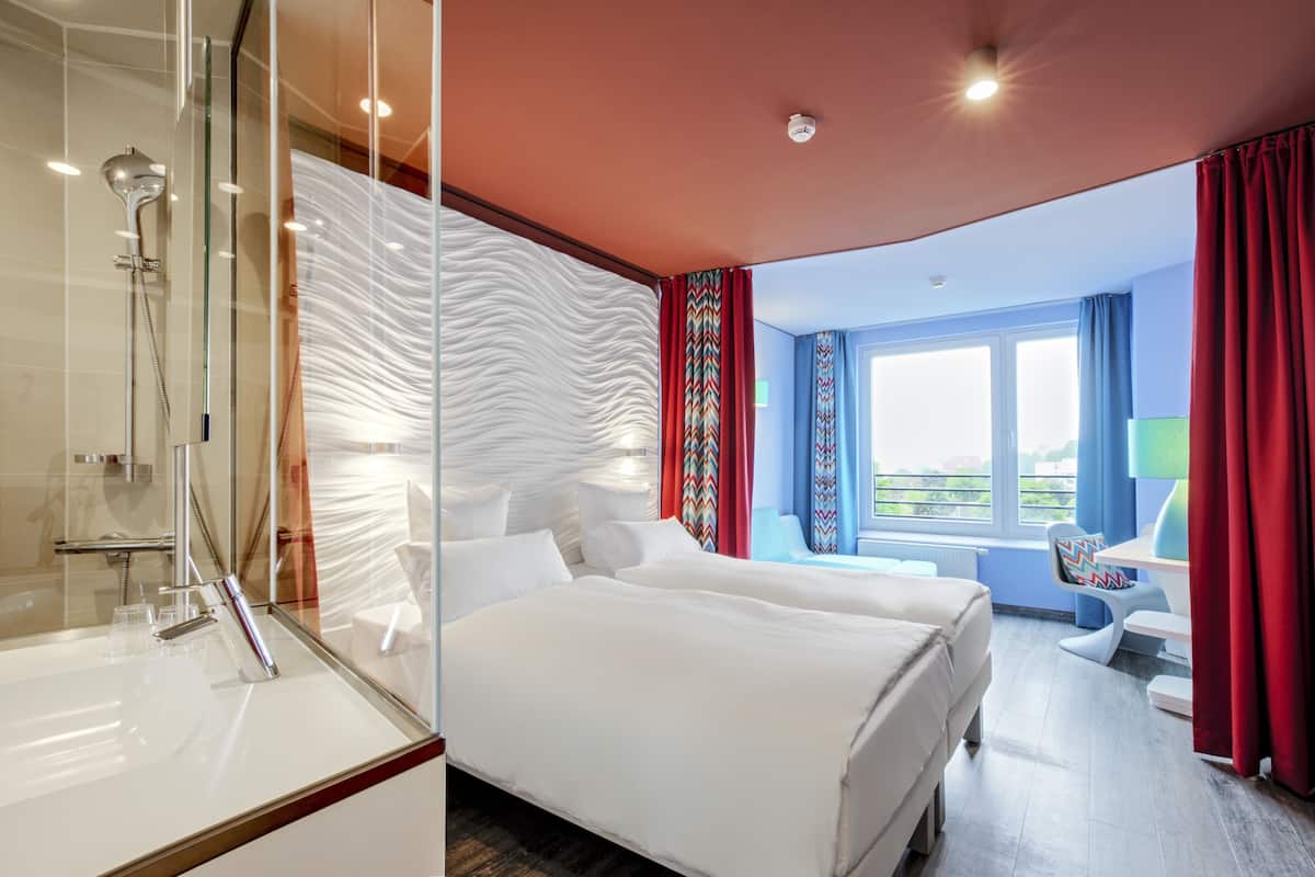 hypo-allergenic bedding, desk, blackout curtains, free wifi