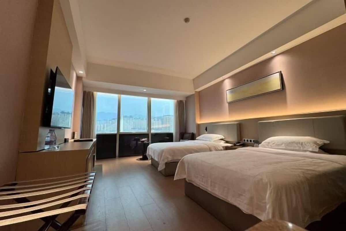 Minibar, coffres-forts dans les chambres, fer et planche à repasser