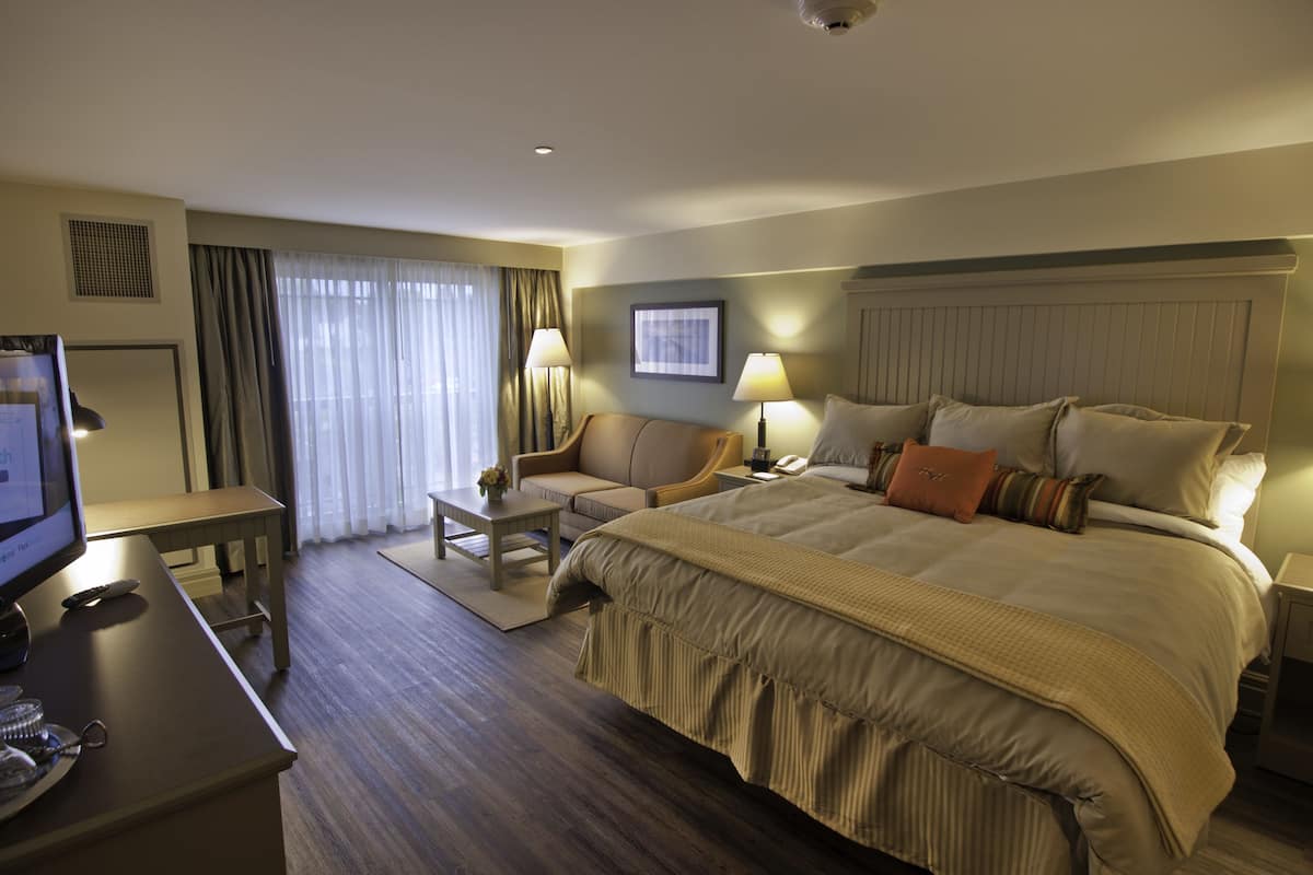 king sofa village view | in-room safe, desk, iron/ironing board, free wifi