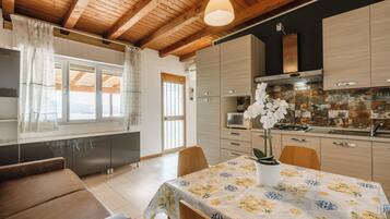 Apartment, 1 Bedroom | Living area | LCD TV