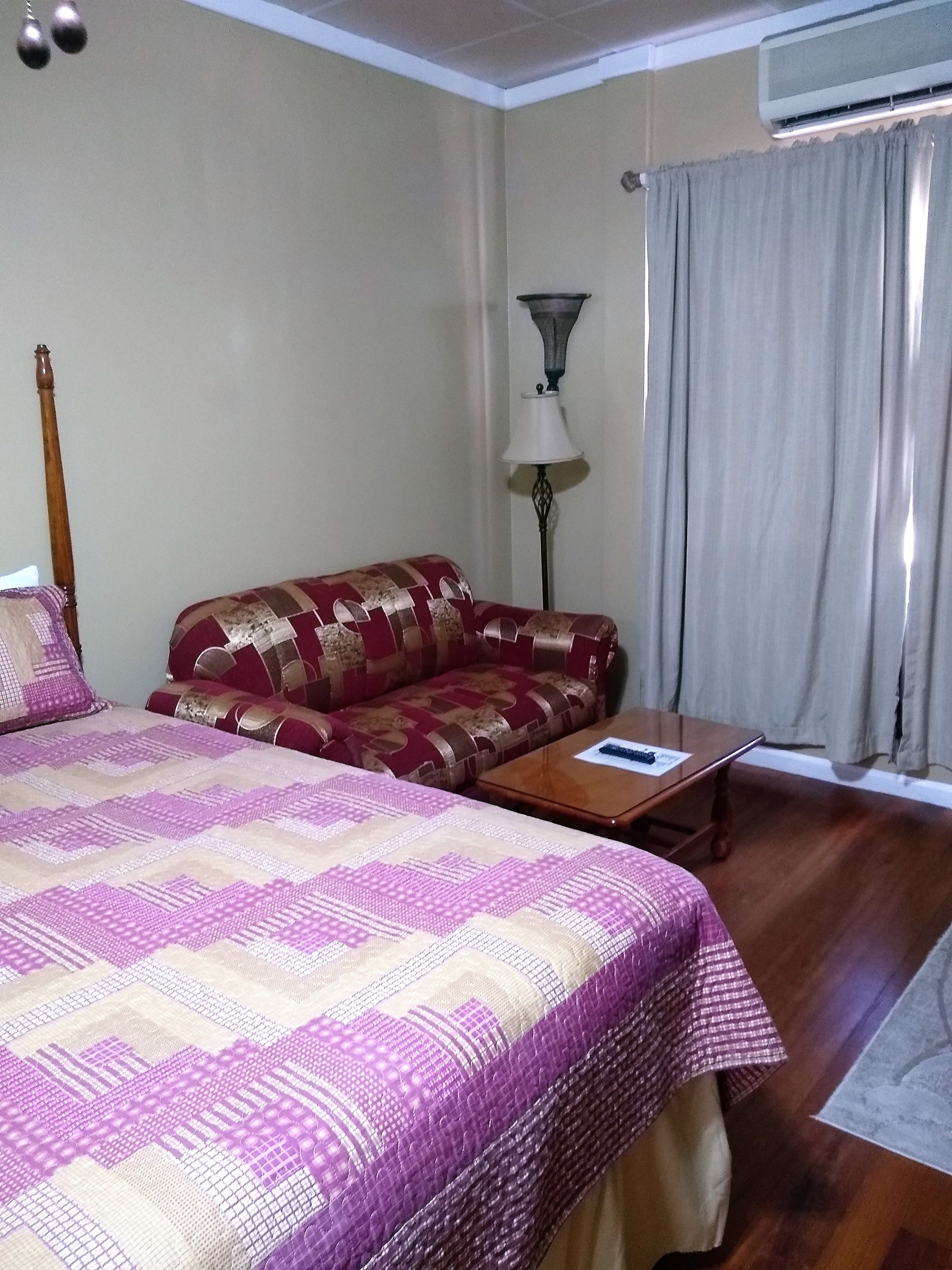 deluxe room, 2 queen beds, balcony, partial sea view | living area | 40-inch smart tv with cable channels, tv, netflix