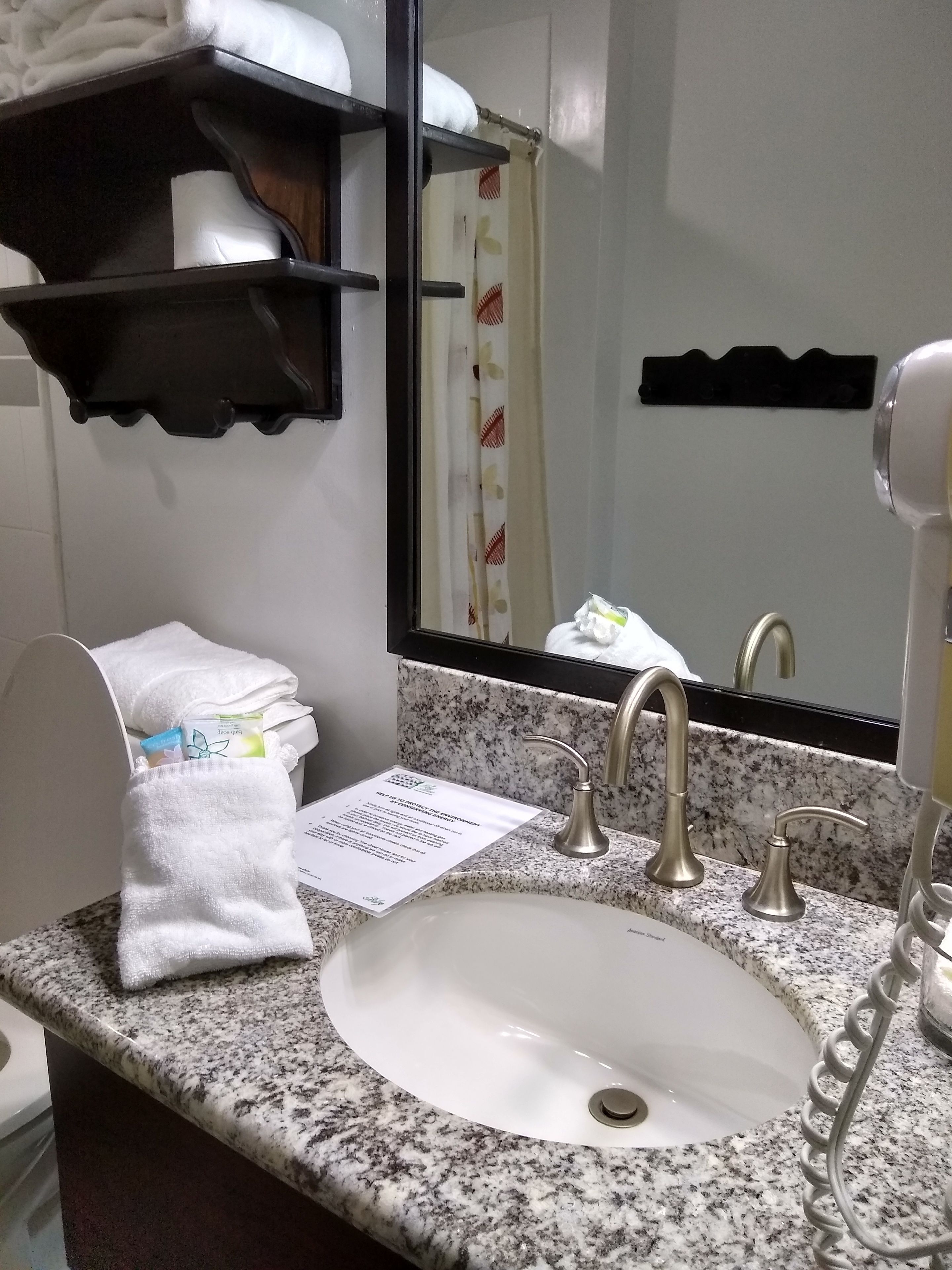 superior room, 1 queen bed, courtyard view | bathroom | combined shower/bathtub, free toiletries, hair dryer, towels