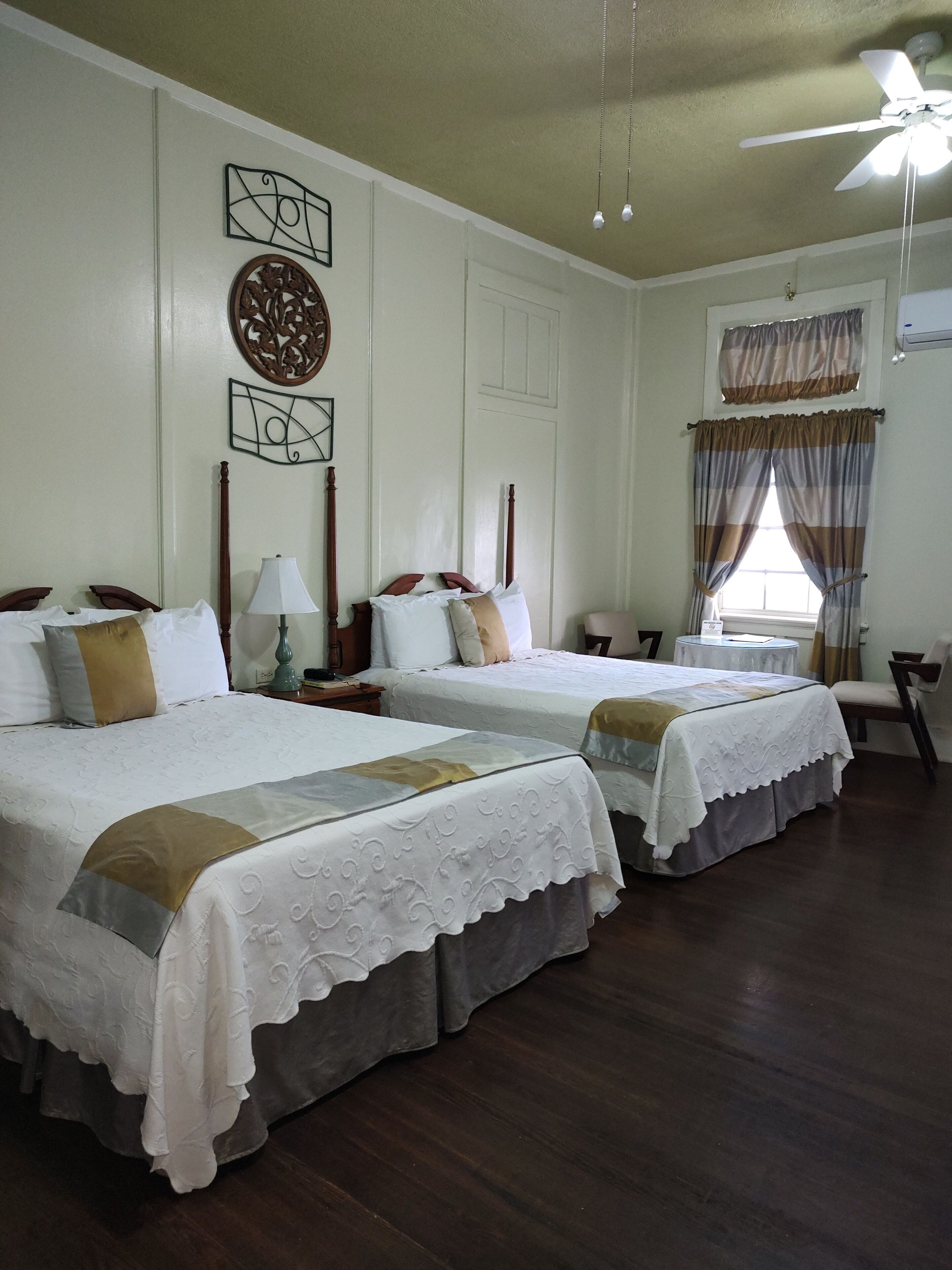 deluxe room, 2 queen beds, balcony, partial sea view | 1 bedroom, hypo-allergenic bedding, down duvets, in-room safe