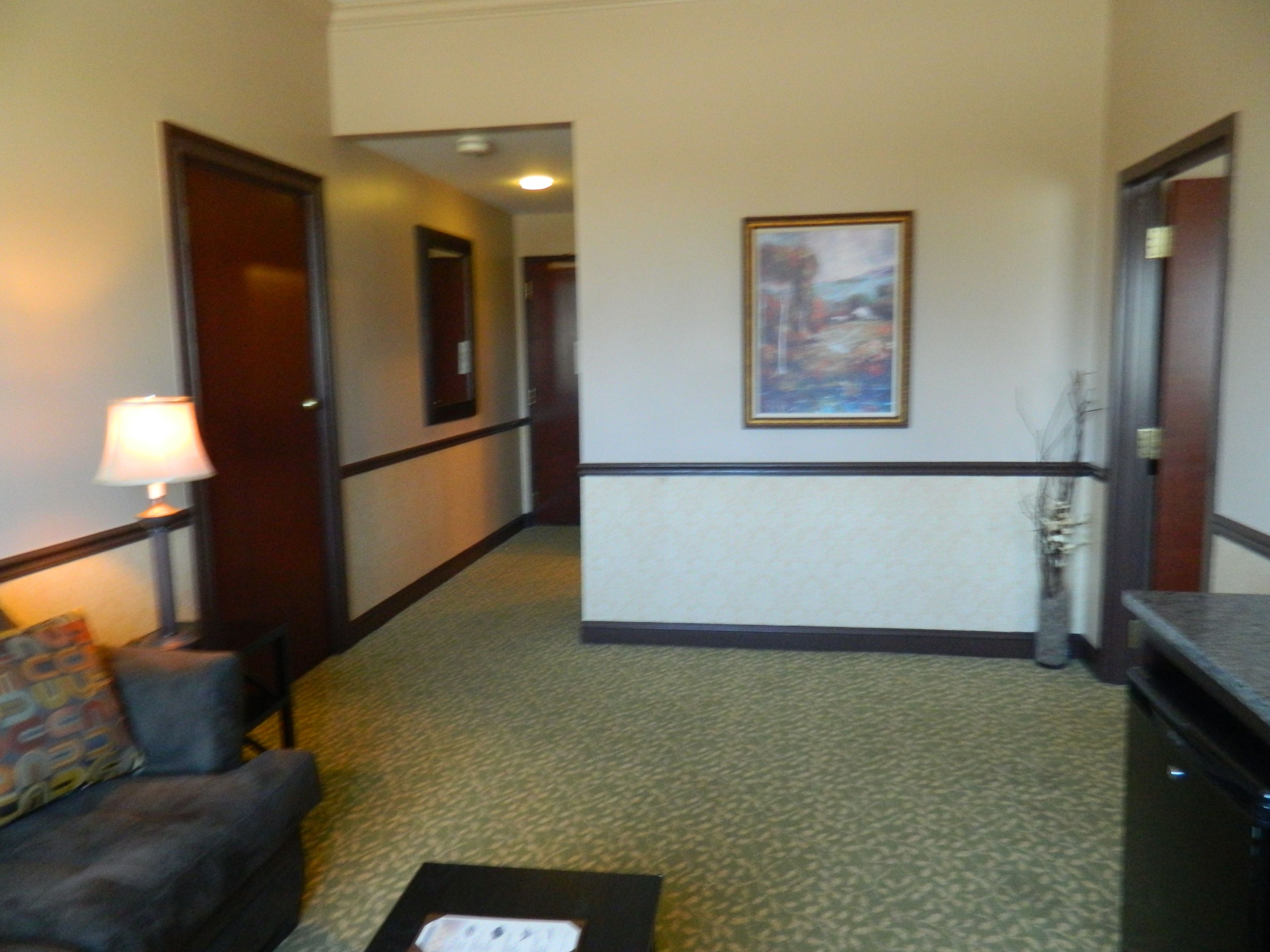 superior suite, 1 king bed, jetted tub | 1 bedroom, desk, iron/ironing board, free wifi
