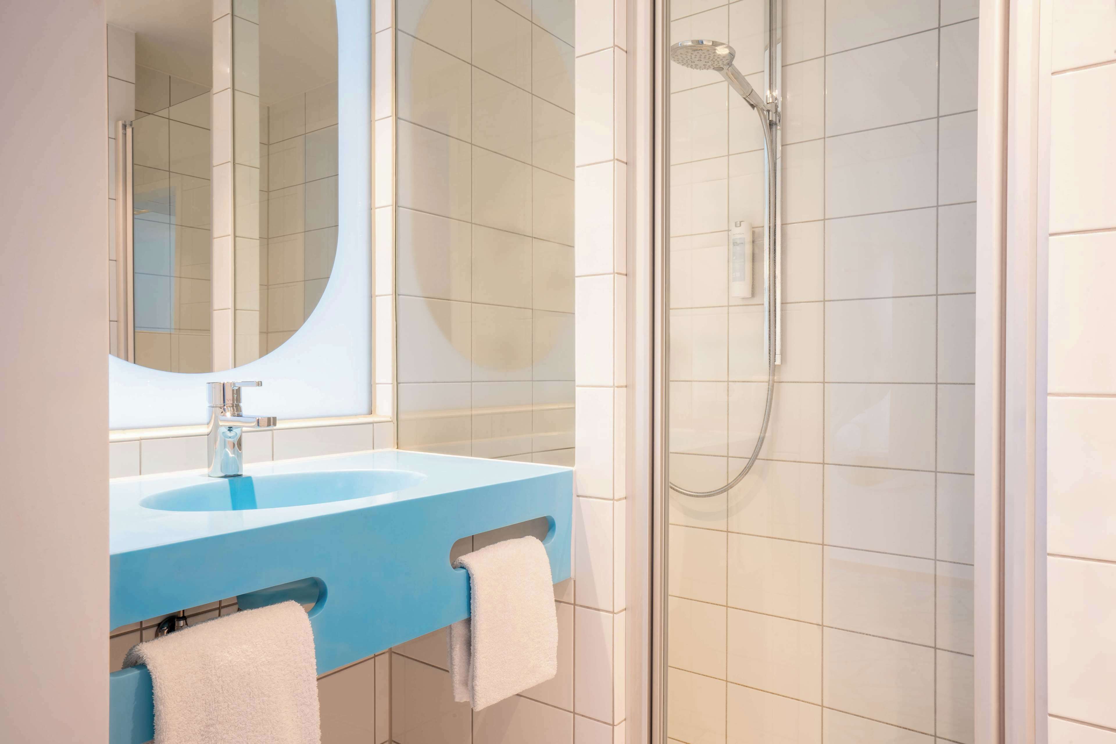 shower, rainfall showerhead, eco-friendly toiletries, hair dryer