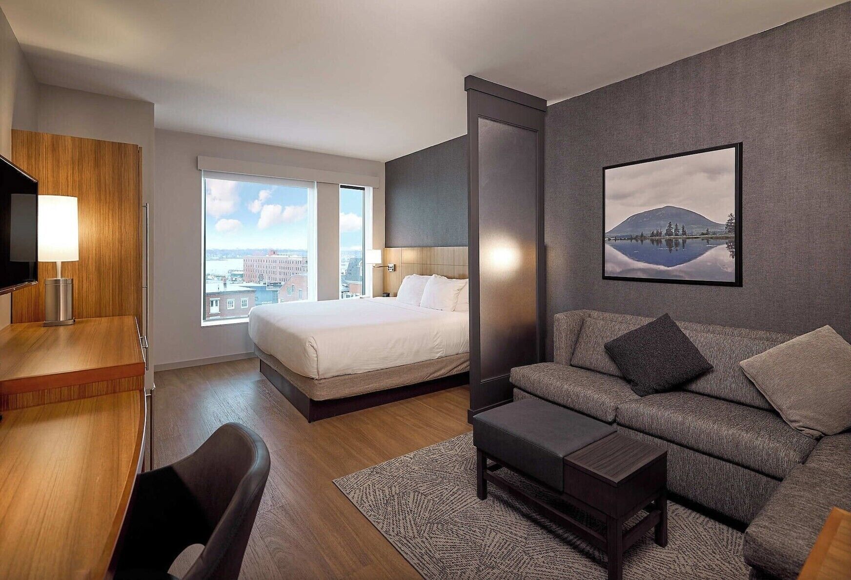 Premium bedding, individually furnished, desk, laptop workspace