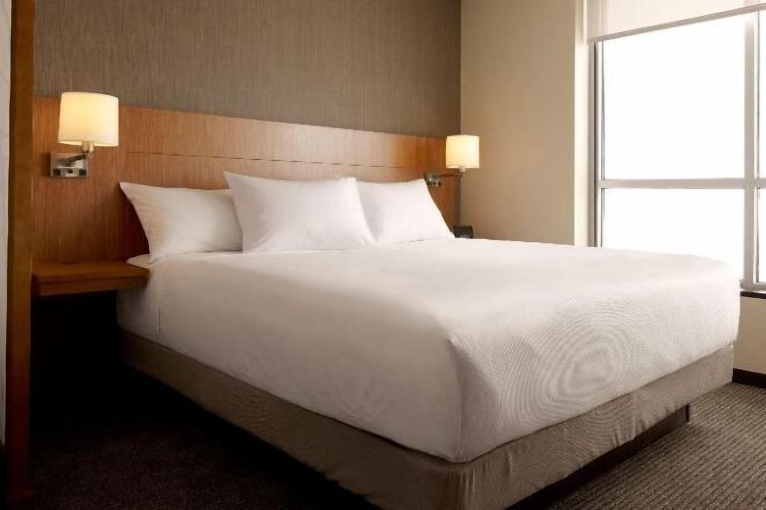 Premium bedding, individually furnished, desk, laptop workspace