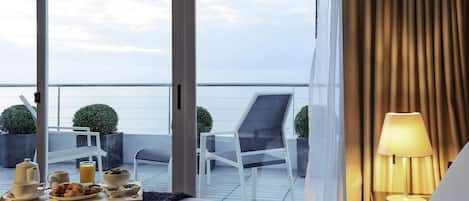 Premium bedding, down comforters, minibar, in-room safe