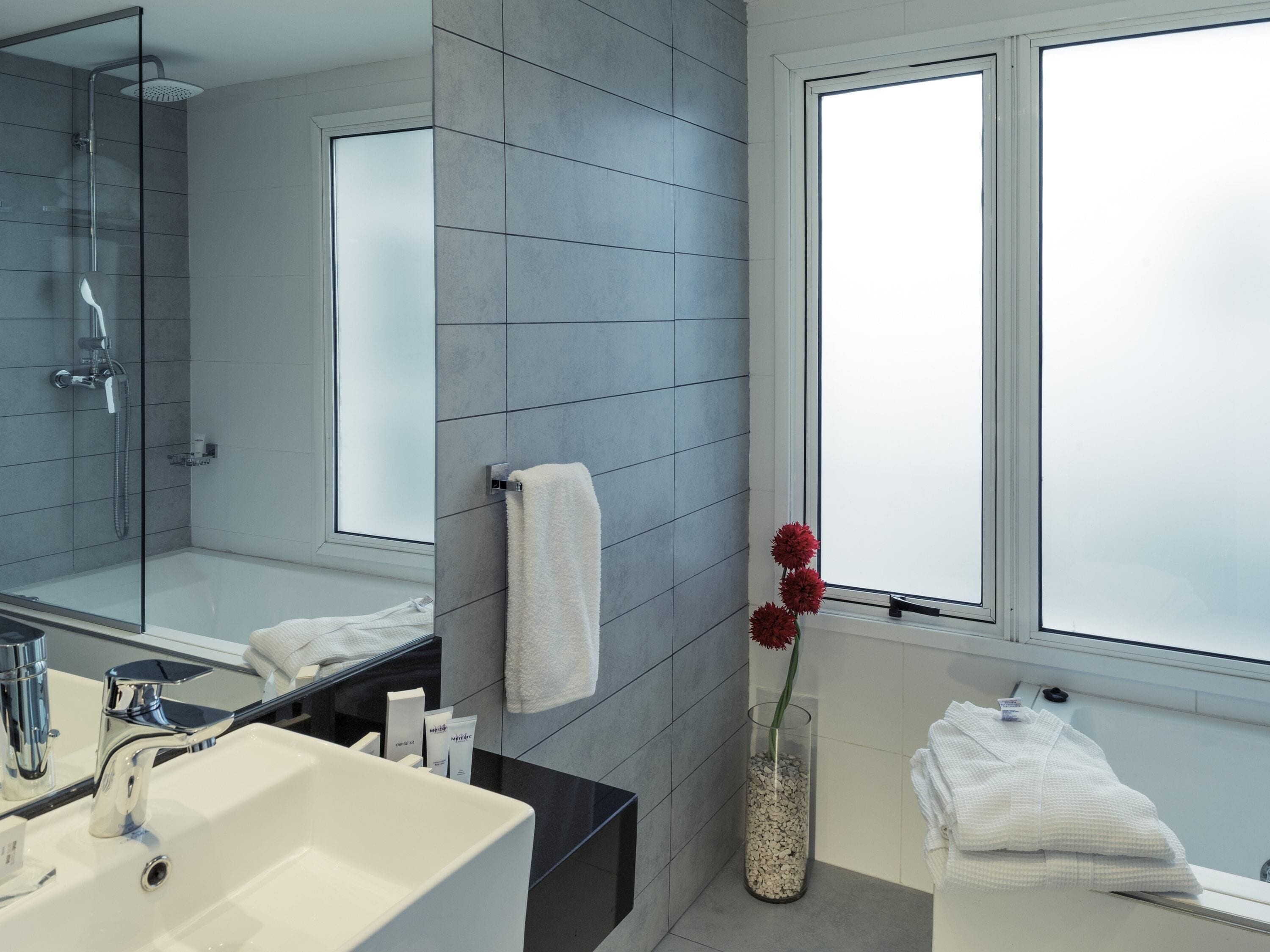 Premium bedding, down duvets, minibar, in-room safe