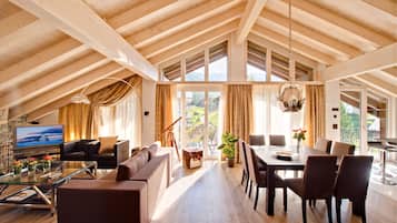 Penthouse Apartment Matterhorn View | Living room | TV, fireplace, DVD player, iPod dock