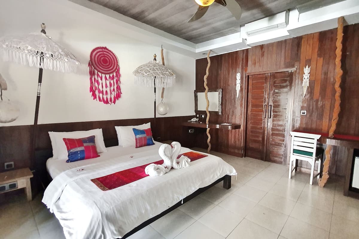 Premium Deluxe King Room | Ropa de cama de alta calidad y minibar