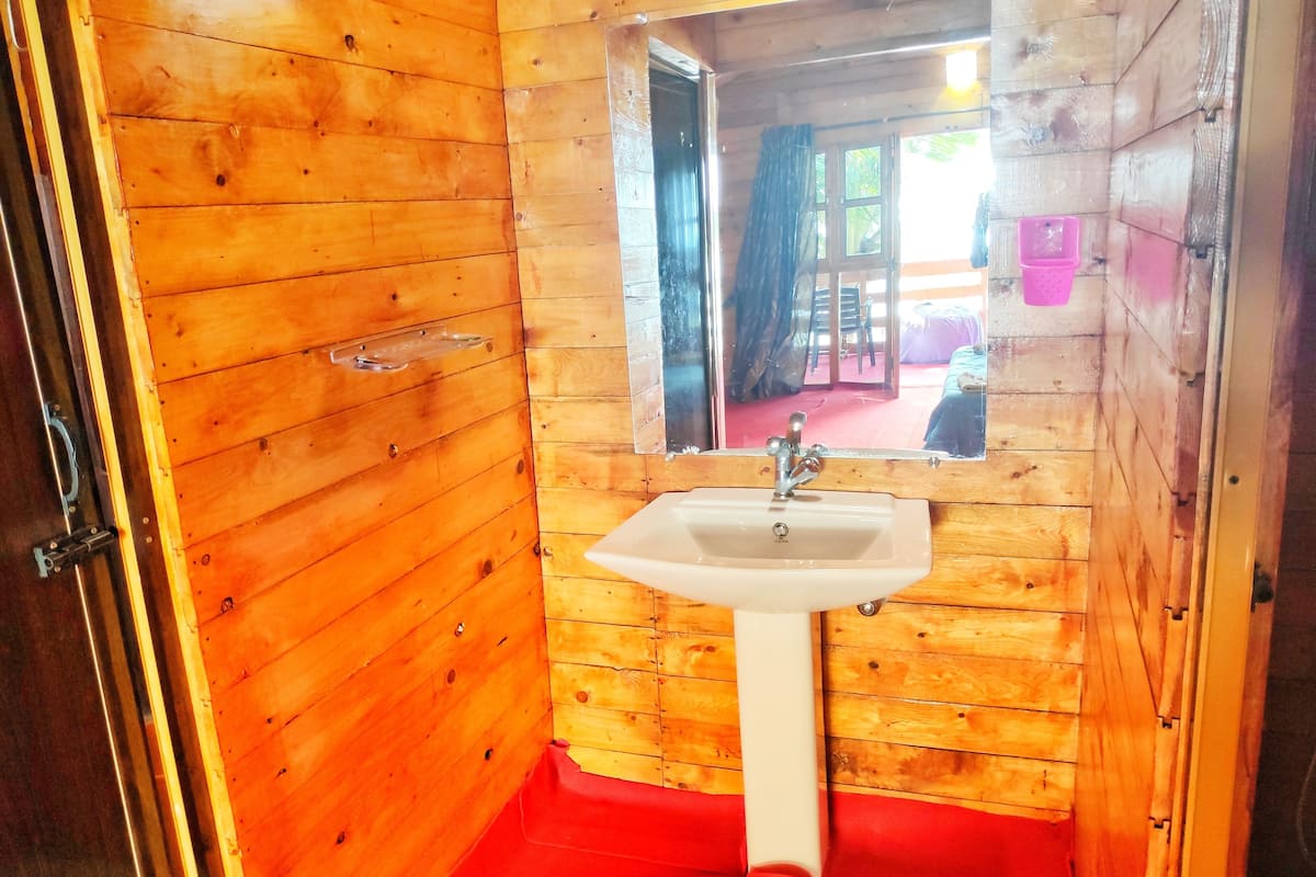 deluxe ac sea facing high rise hut | desk, iron/ironing board, rollaway beds, wifi