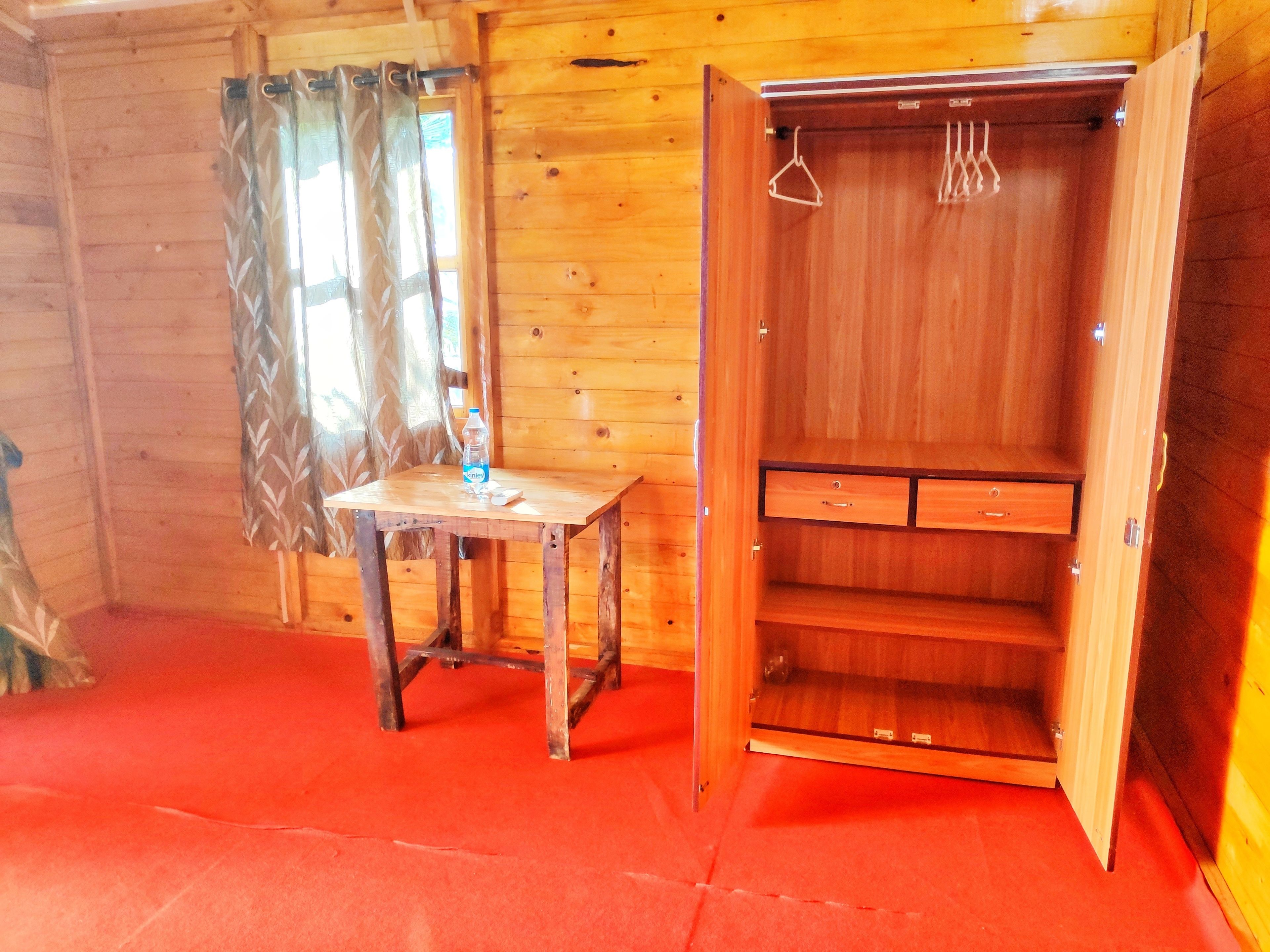 deluxe ac sea facing high rise hut | desk, iron/ironing board, rollaway beds, wifi