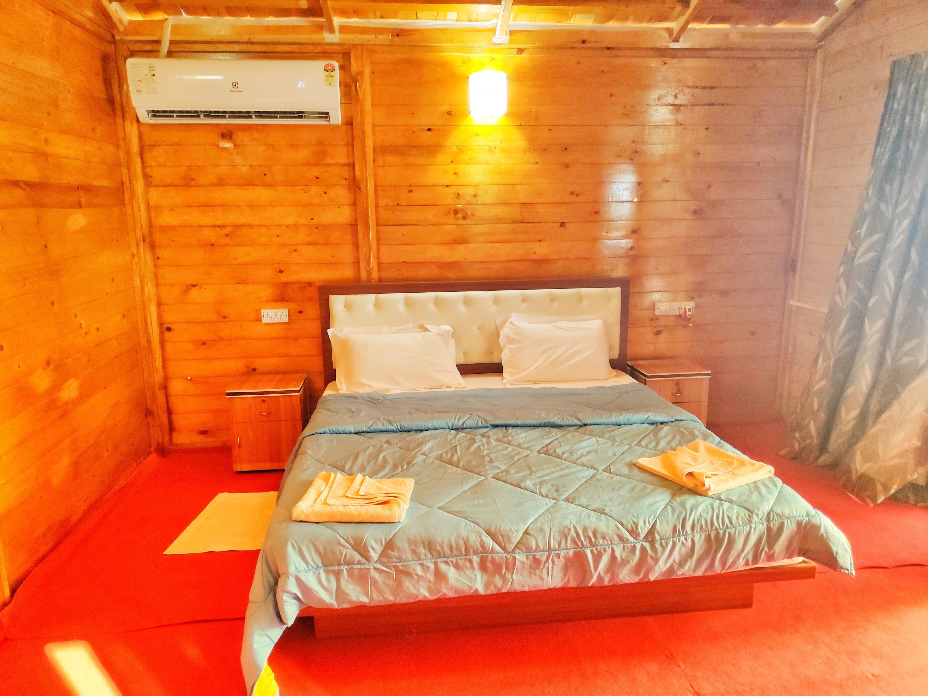 deluxe ac sea facing high rise hut | desk, iron/ironing board, rollaway beds, wifi
