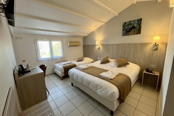 Standard Triple Room | Premium bedding, in-room safe, desk, blackout drapes