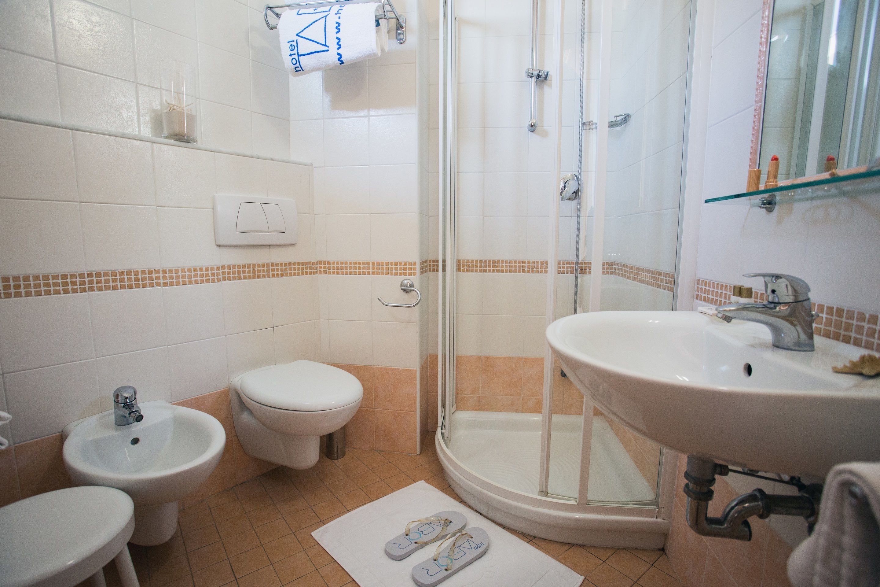 shower, free toiletries, hair dryer, slippers