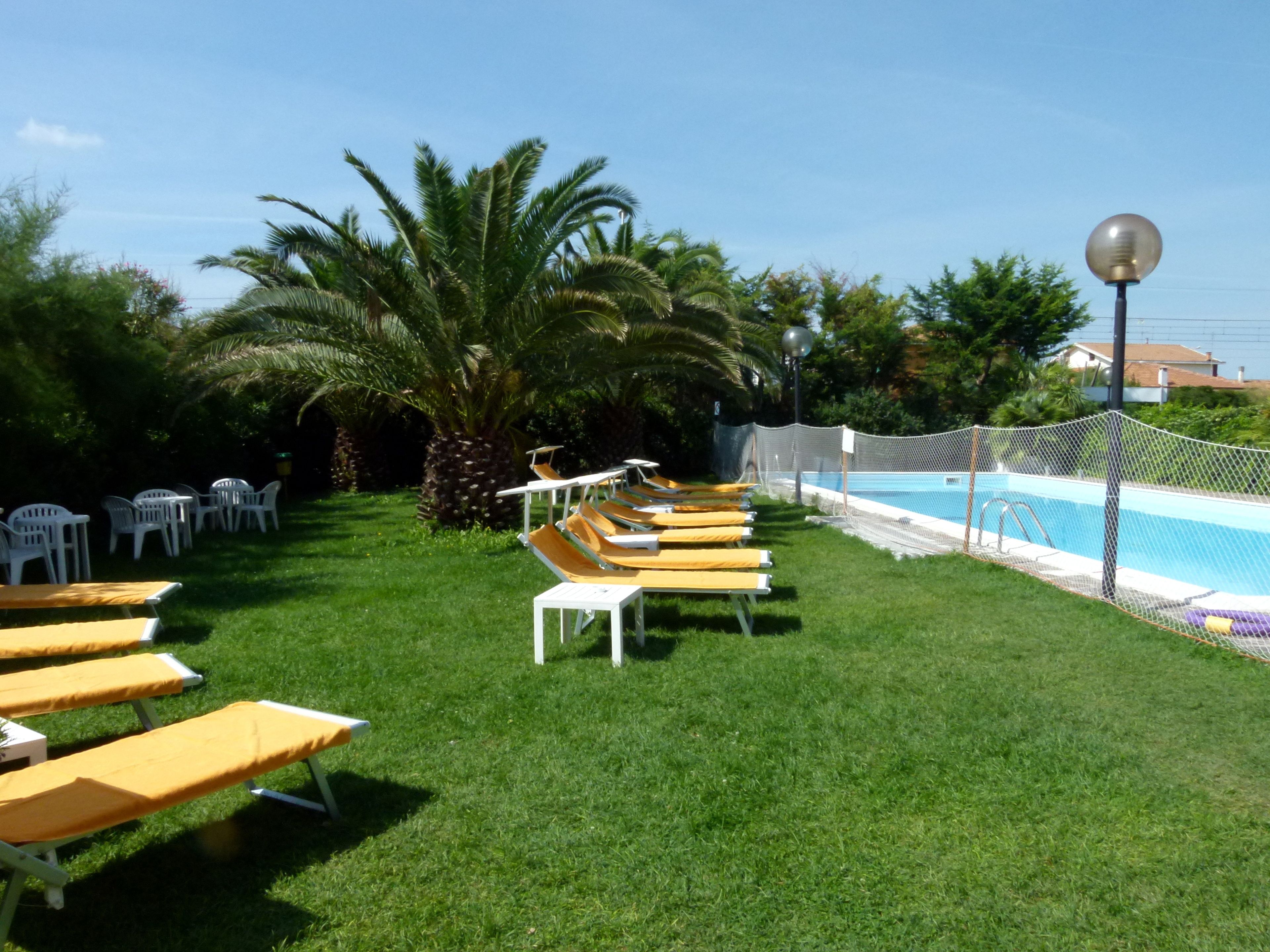 outdoor pool, pool loungers