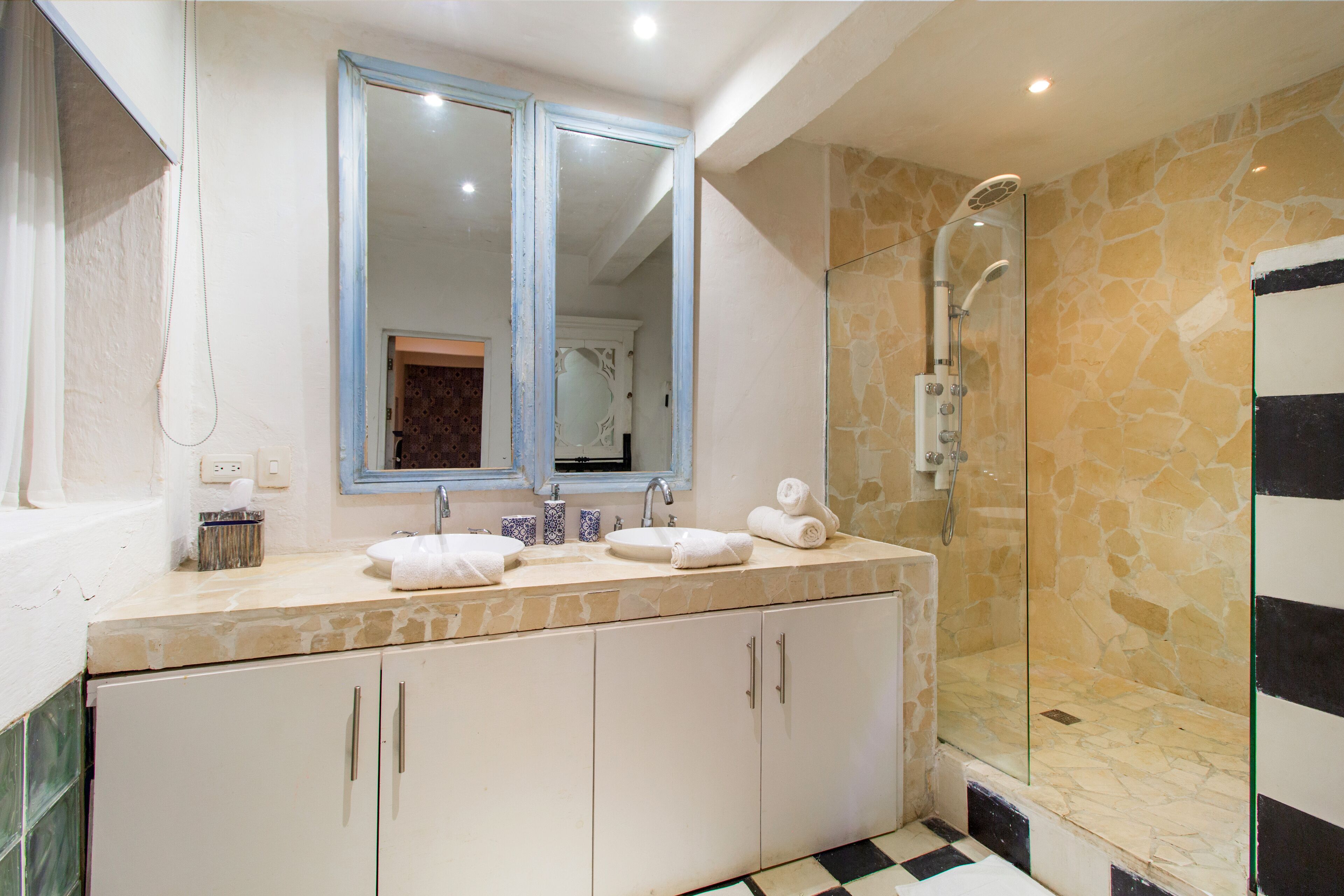 family room, multiple beds | bathroom | shower, eco-friendly toiletries, hair dryer, towels