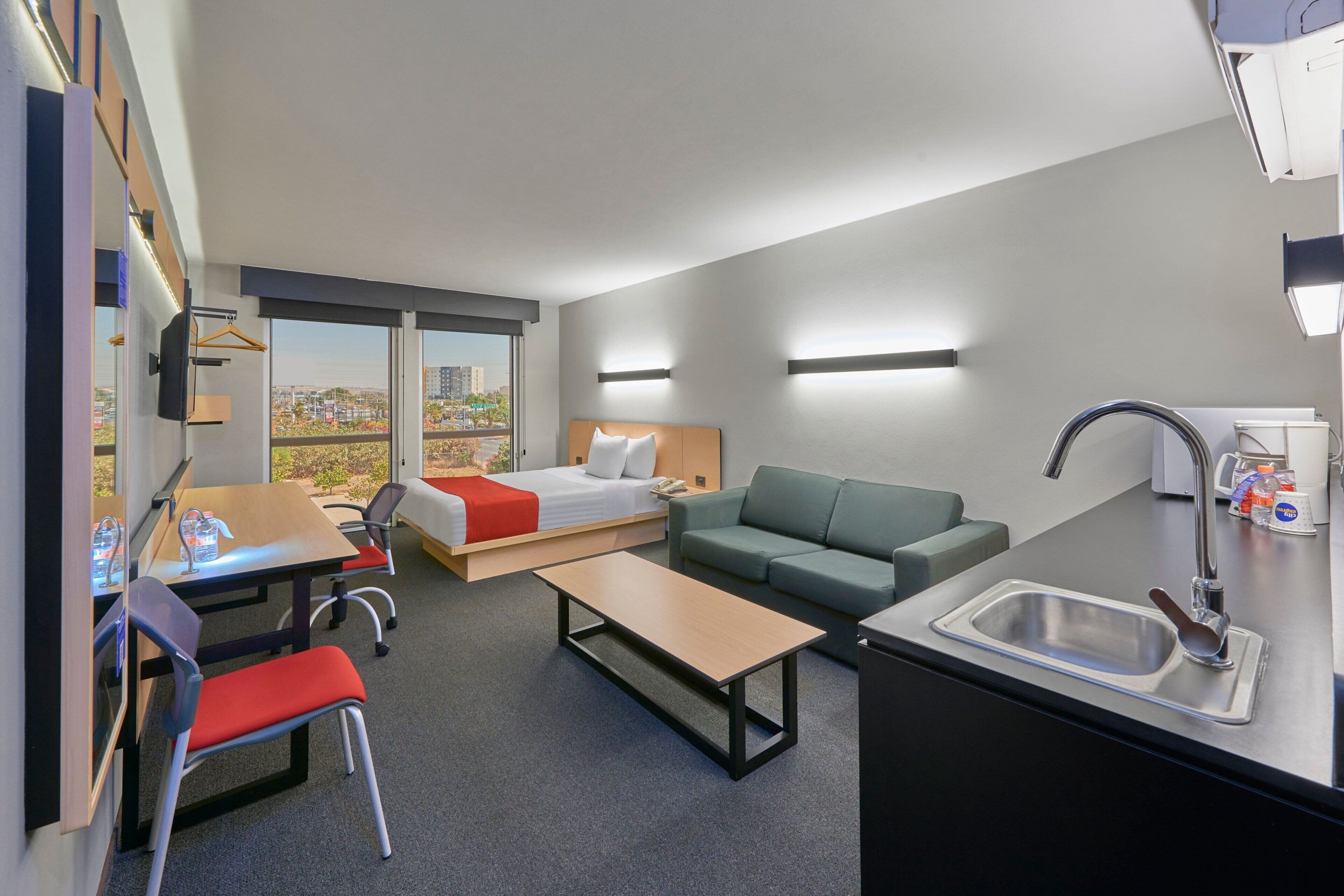 superior room, 1 queen bed with sofa bed, non smoking | in-room safe, desk, iron/ironing board, free wifi