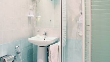 Shower, hair dryer, bathrobes, slippers