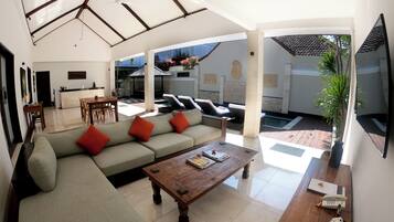 Deluxe Villa, 2 Bedrooms (Ganesha) | Living area | 50-inch LCD TV with satellite channels