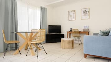 Superior Apartment, 1 Bedroom | Living area | 42-inch flat-screen TV with digital channels, TV, Netflix