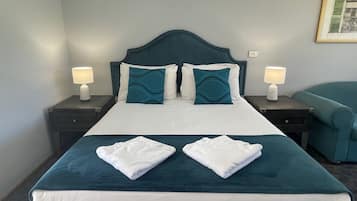 Premium bedding, pillowtop beds, desk, laptop workspace