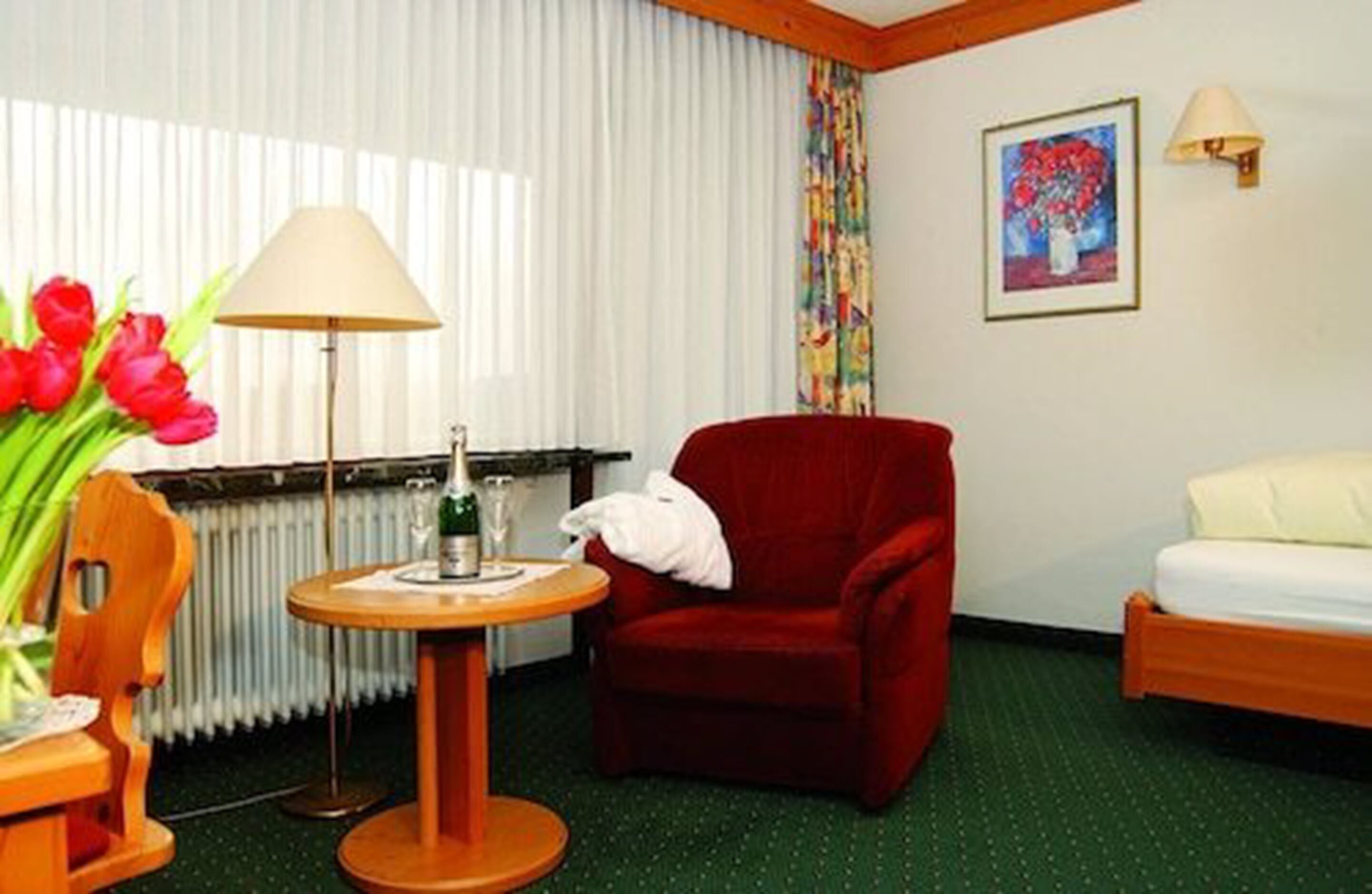 deluxe single room, balcony | in-room safe, individually furnished, desk, travel cot