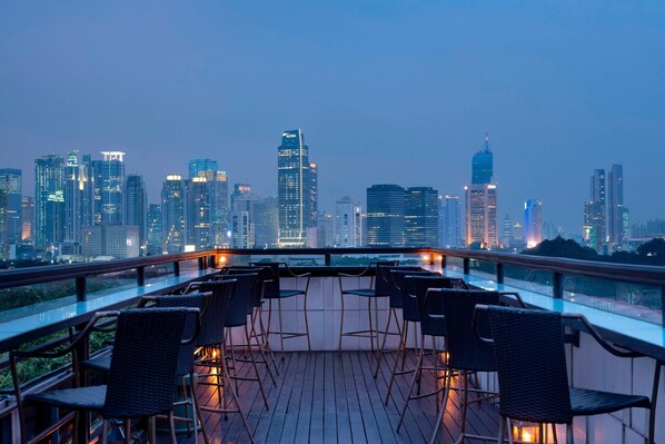 Rooftop bar, pool views, open daily