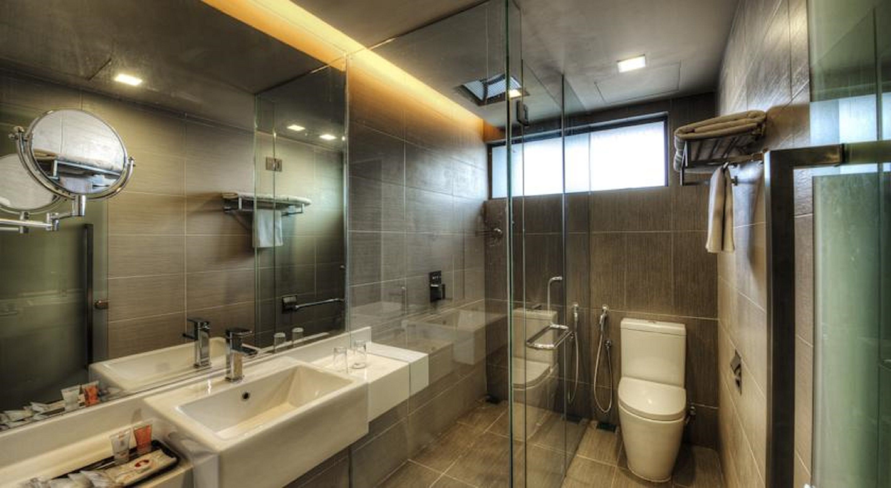 shower, hair dryer, slippers, towels