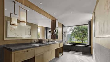 Deluxe Room, 1 King Bed, Bathtub | Bathroom | Separate tub and shower, free toiletries, hair dryer, bathrobes