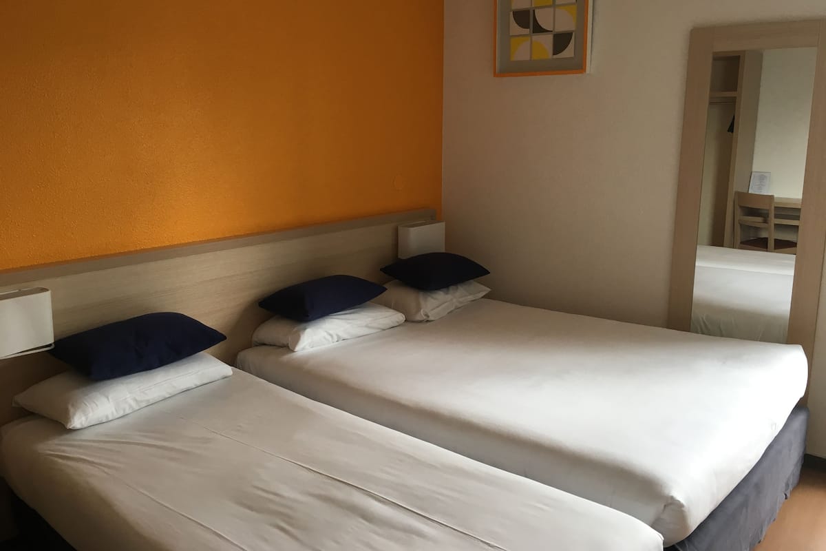 Triple Room | Premium bedding, minibar, desk, laptop workspace