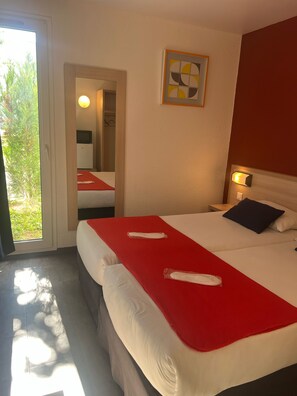 Literie de qualité supérieure, minibar, décoration personnalisée